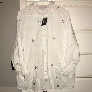 White button down shirt with music notes
